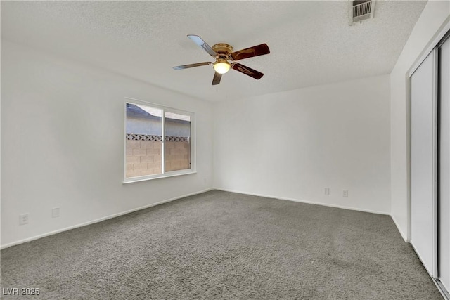 1676 Divinity St, Las Vegas, NV 89142 - carpeted spare room featuring a ceiling fan and a textured ceiling