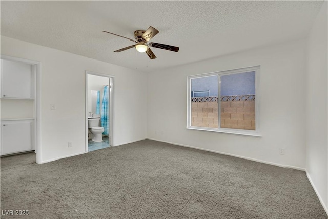 1676 Divinity St, Las Vegas, NV 89142 - unfurnished bedroom with carpet floors, a textured ceiling, connected bathroom, and a ceiling fan