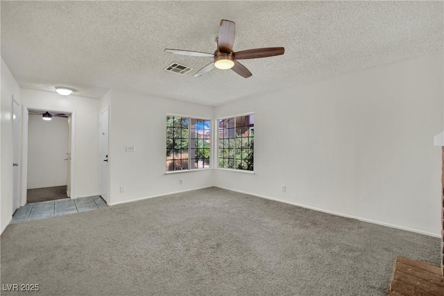1676 Divinity St, Las Vegas, NV 89142 - carpeted empty room featuring ceiling fan and a textured ceiling