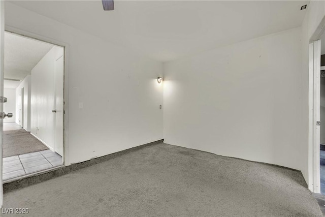 1676 Divinity St, Las Vegas, NV 89142 - empty room with carpet floors and ceiling fan