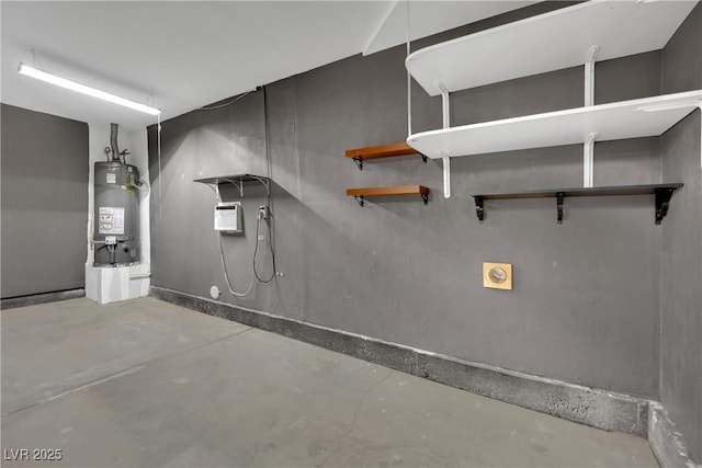 1676 Divinity St, Las Vegas, NV 89142 - garage featuring secured water heater and an AC wall unit