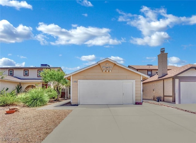 1676 Divinity St, Las Vegas, NV 89142 - view of front of property with a garage and driveway