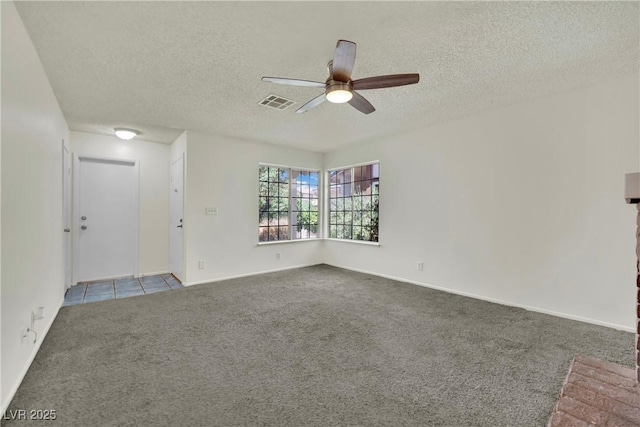 1676 Divinity St, Las Vegas, NV 89142 - spare room with a ceiling fan, carpet, and a textured ceiling