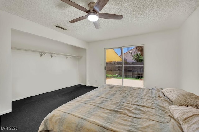 1676 Divinity St, Las Vegas, NV 89142 - bedroom with access to exterior, a textured ceiling, and ceiling fan