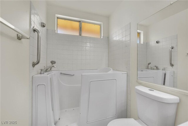 1676 Divinity St, Las Vegas, NV 89142 - full bathroom with tile walls and a bath