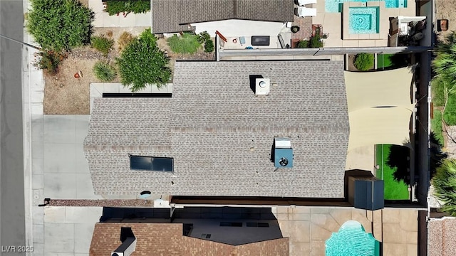 1676 Divinity St, Las Vegas, NV 89142 - drone / aerial view of a pool area