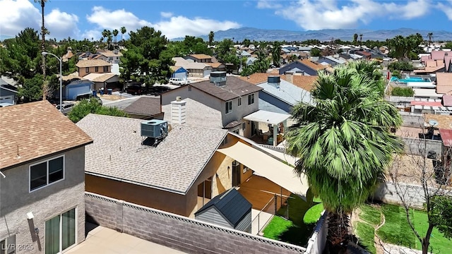 1676 Divinity St, Las Vegas, NV 89142 - aerial view of residential area featuring a mountainous background