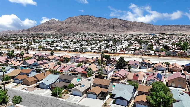 1676 Divinity St, Las Vegas, NV 89142 - aerial view of residential area featuring a mountain backdrop