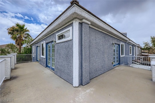 247 Integrity Ridge Dr, Henderson, NV 89052 - view of property exterior featuring stucco siding