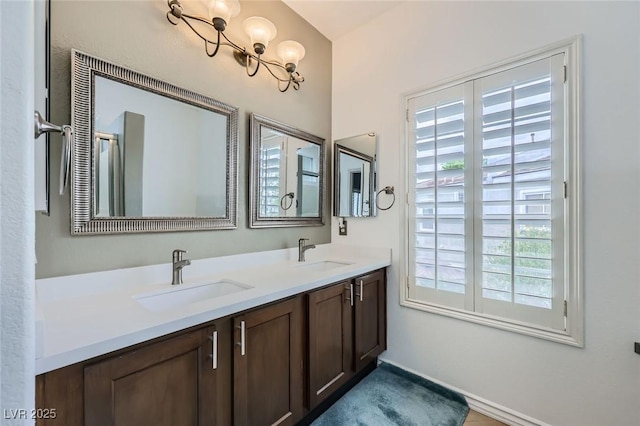 247 Integrity Ridge Dr, Henderson, NV 89052 - full bathroom with double vanity and baseboards