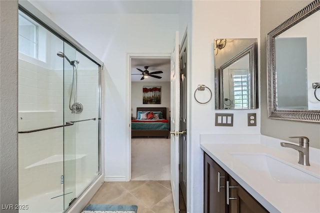 247 Integrity Ridge Dr, Henderson, NV 89052 - ensuite bathroom featuring plenty of natural light, a stall shower, vanity, and a ceiling fan