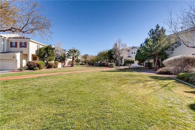 247 Integrity Ridge Dr, Henderson, NV 89052 - view of green lawn featuring a residential view