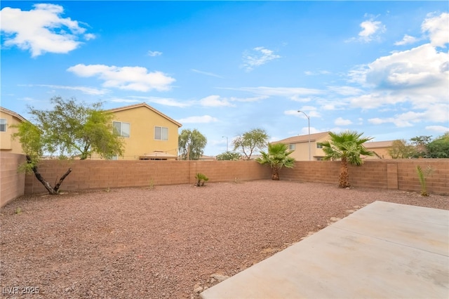 3844 Kit Fox St, Las Vegas, NV 89122 - fenced backyard featuring a patio area