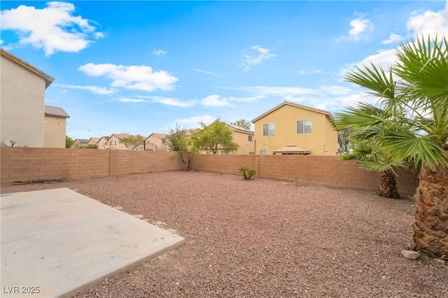 3844 Kit Fox St, Las Vegas, NV 89122 - fenced backyard with a patio