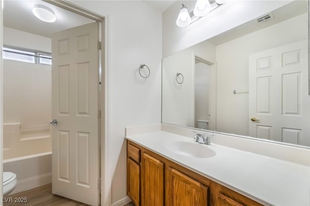 3844 Kit Fox St, Las Vegas, NV 89122 - bathroom with vanity, shower / bath combination, and wood finished floors