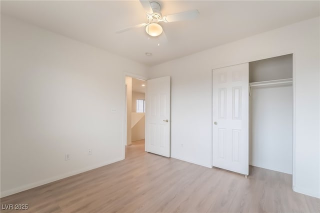 3844 Kit Fox St, Las Vegas, NV 89122 - unfurnished bedroom featuring light wood-style flooring, a closet, and a ceiling fan