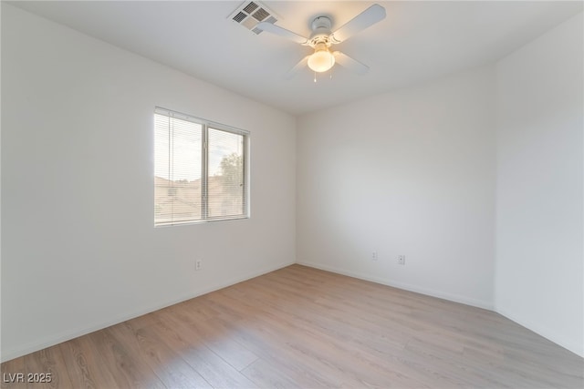 3844 Kit Fox St, Las Vegas, NV 89122 - unfurnished room featuring light wood-style floors and ceiling fan