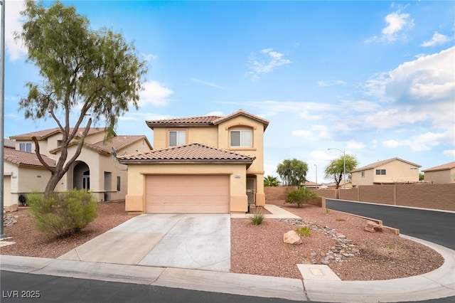 3844 Kit Fox St, Las Vegas, NV 89122 - mediterranean / spanish-style home with stucco siding, an attached garage, a tile roof, and concrete driveway