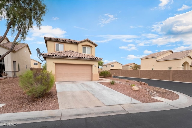 3844 Kit Fox St, Las Vegas, NV 89122 - mediterranean / spanish home featuring stucco siding, concrete driveway, a tiled roof, a garage, and a residential view