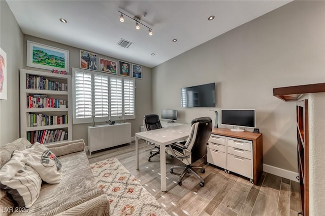22 Starbrook Dr, Henderson, NV 89052 - office space featuring light wood-style flooring, recessed lighting, and vaulted ceiling