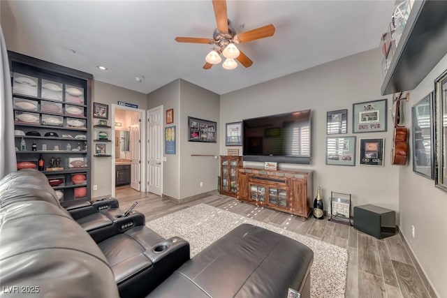 22 Starbrook Dr, Henderson, NV 89052 - living room featuring light wood-style floors and a ceiling fan