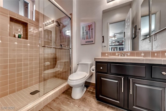 22 Starbrook Dr, Henderson, NV 89052 - full bath featuring wood finished floors, a stall shower, and vanity