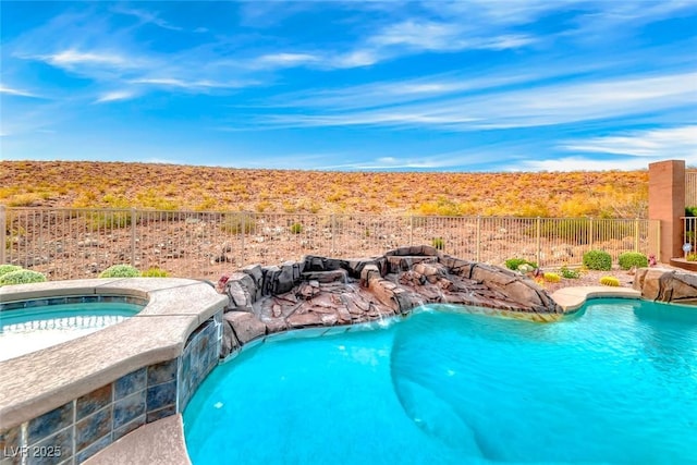 22 Starbrook Dr, Henderson, NV 89052 - view of pool with an in-ground hot tub and a fenced backyard