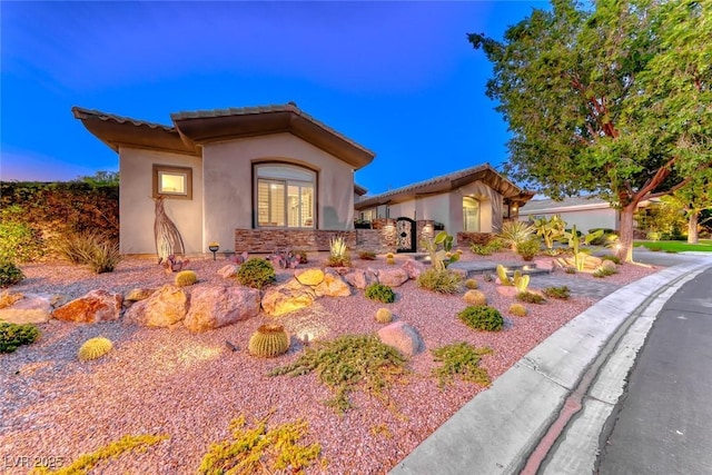 22 Starbrook Dr, Henderson, NV 89052 - mediterranean / spanish-style house featuring stucco siding and a tile roof
