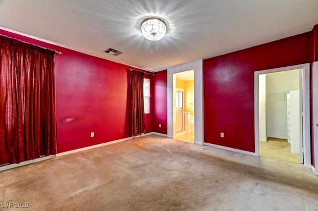 6720 Sand Swallow St, North Las Vegas, NV 89084 - unfurnished bedroom featuring carpet, a chandelier, and ensuite bathroom