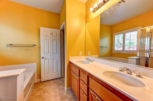 6720 Sand Swallow St, North Las Vegas, NV 89084 - bathroom with a bath, double vanity, and a shower stall
