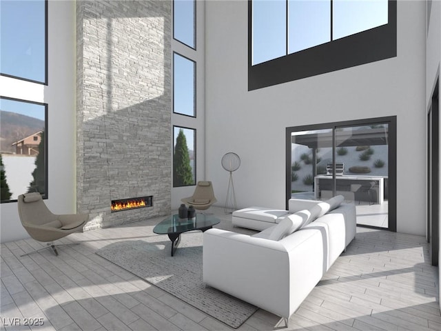 5 Rue Grimaldi Way, Henderson, NV 89011 - living area with a high ceiling, an outdoor stone fireplace, and wood finished floors