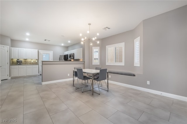 1641 Dark Wolf Ave, Las Vegas, NV 89123 - dining area featuring a chandelier, recessed lighting, and light tile patterned floors