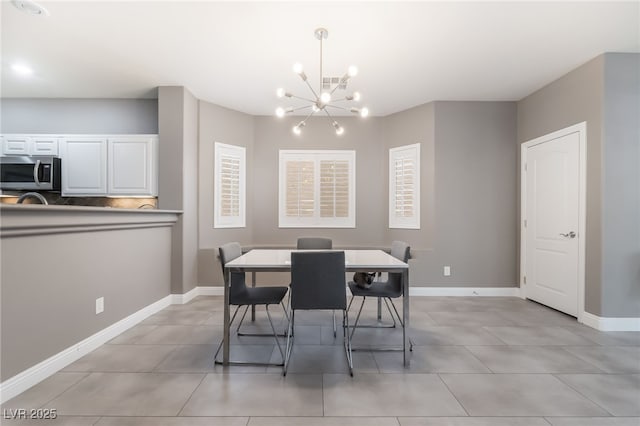 1641 Dark Wolf Ave, Las Vegas, NV 89123 - dining space with a chandelier and light tile patterned flooring