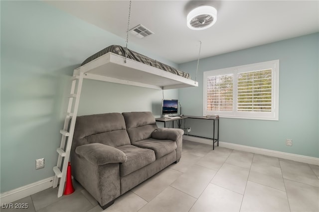 1641 Dark Wolf Ave, Las Vegas, NV 89123 - living area with a desk and tile patterned floors