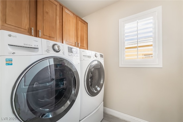 1641 Dark Wolf Ave, Las Vegas, NV 89123 - laundry room with independent washer and dryer, cabinet space, and light tile patterned flooring