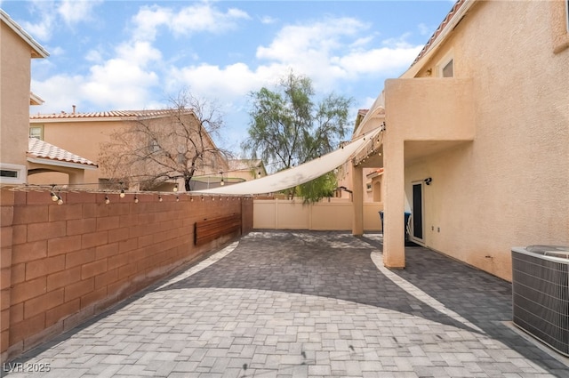 1641 Dark Wolf Ave, Las Vegas, NV 89123 - fenced backyard featuring a patio area