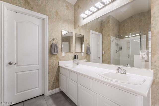 1641 Dark Wolf Ave, Las Vegas, NV 89123 - full bathroom featuring wallpapered walls, a shower stall, double vanity, and tile patterned floors