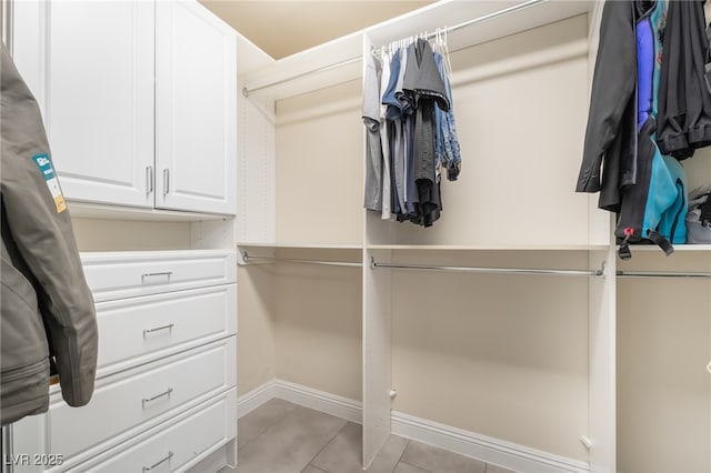 1641 Dark Wolf Ave, Las Vegas, NV 89123 - walk in closet featuring light tile patterned floors