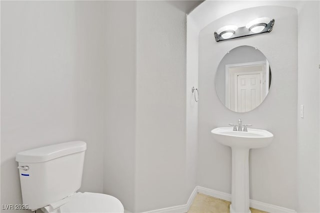 10015 Willowbrook Pond Rd, Las Vegas, NV 89148 - half bathroom with toilet and a sink