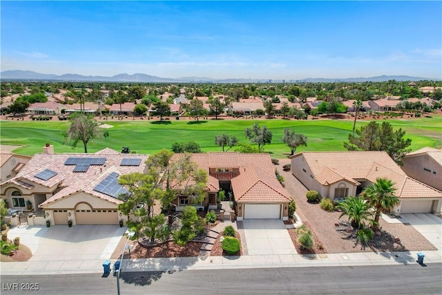 2832 Castle Bar Dr, Las Vegas, NV 89134 - aerial view of residential area featuring a local golf course and a mountain backdrop