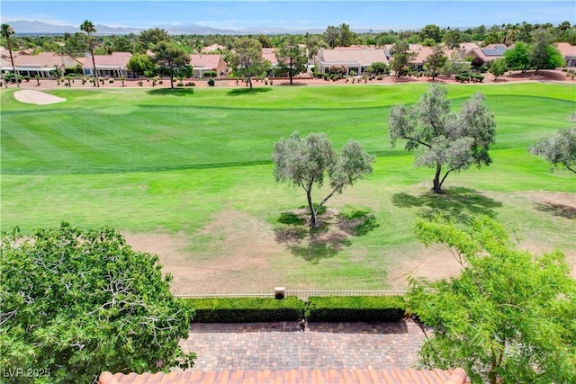 2832 Castle Bar Dr, Las Vegas, NV 89134 - view of property's community with view of golf course, a residential view, a yard, and a mountain view