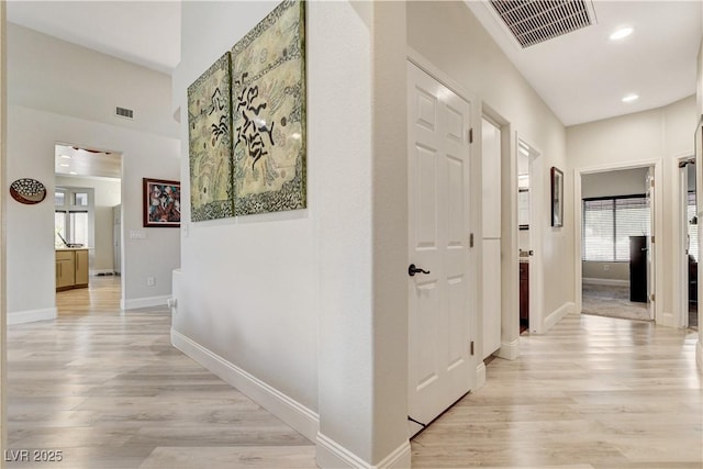 2832 Castle Bar Dr, Las Vegas, NV 89134 - hall with light wood-style flooring and recessed lighting