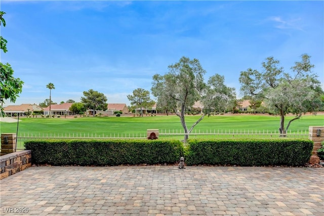 2832 Castle Bar Dr, Las Vegas, NV 89134 - view of property's community with view of golf course, a lawn, and a residential view