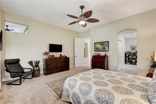 2832 Castle Bar Dr, Las Vegas, NV 89134 - carpeted bedroom featuring arched walkways and a ceiling fan