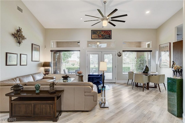 2832 Castle Bar Dr, Las Vegas, NV 89134 - living room featuring ceiling fan, plenty of natural light, light wood-style floors, and recessed lighting