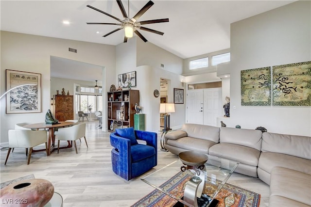 2832 Castle Bar Dr, Las Vegas, NV 89134 - living area with a ceiling fan, light wood-style flooring, high vaulted ceiling, and recessed lighting