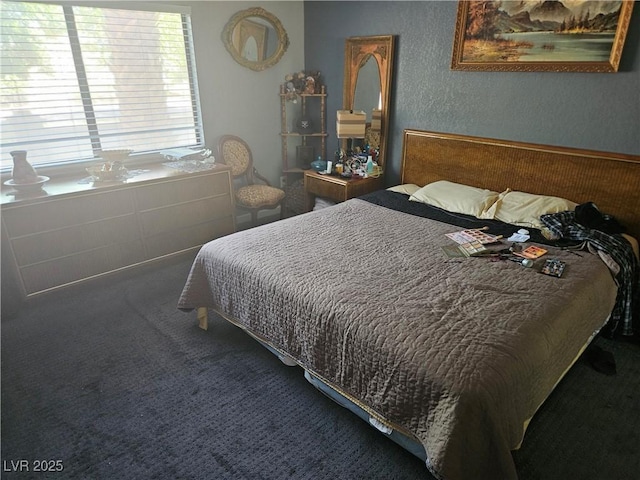 1341 Del Mar St Unit 101, Las Vegas, NV 89119 - carpeted bedroom with a textured wall
