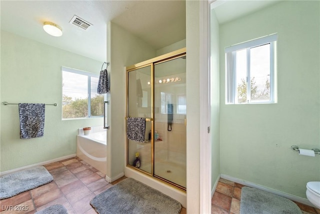 200 E Domingo St, Pahrump, NV 89048 - full bath with plenty of natural light, a garden tub, and a stall shower