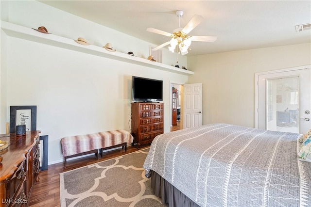 200 E Domingo St, Pahrump, NV 89048 - bedroom with wood finished floors and ceiling fan