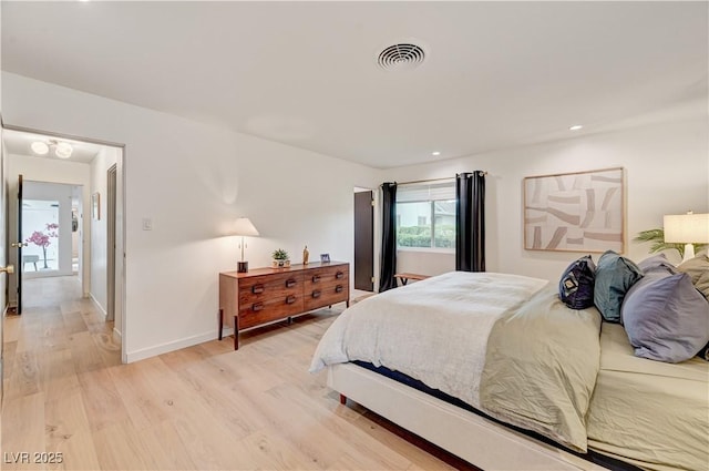 3022 El Camino Ave, Las Vegas, NV 89102 - bedroom with light wood-style flooring and recessed lighting